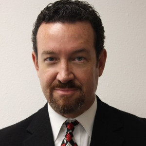A man in a suit and tie.
